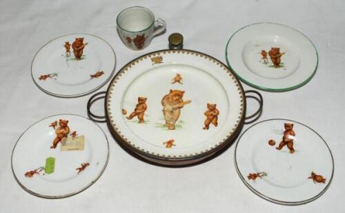 'Sporting Bears'. Copper warming dish with ceramic surface with image of bears playing cricket, football and roller skating to centre. 9.5&quot; diameter with handles to sides. Minor wear to central image otherwise in good condition. Rare. Sold with four 