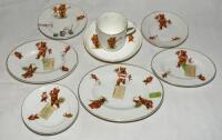 'Sporting Bears'. Three oval dishes, three small side plates, a cup and saucer and an oval pot with lid, all with image of bears playing cricket, football and roller skating. The side plates measure 4.5&quot; diameter, the oval dishes measure 5.5&quot;, 6