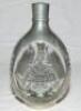 E.W. 'Jim' Swanton. Glass and pewter 'Haig Dimple' whisky decanter with 'Dimple' motif pewter panel to one side, with floral decorations, 'Haig', and coats of arms to sides. Maker's mark for Daalderop Royal Holland Pewter, no. N4919 to base. 8.5&quot; tal