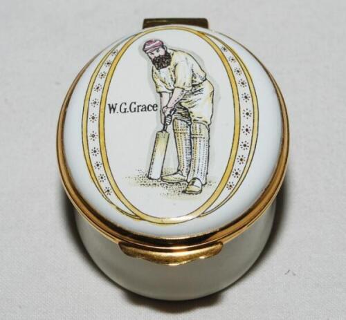 Cricket pillbox. W.G. Grace. Modern enamelled oval pillbox hand decorated with a portrait of Grace in batting pose. Crossed bat, pad and ball to inside lid. Produced by Crummles. VG - cricket