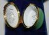 'W.G. Grace'. Halcyon Days oval enamelled pill box. The lid decorated with full length figure of Grace by 'Spy', biographical details of Grace to the inside of the lid, the inside base with inscription, 'W.G. Grace, 1848-1915. Hero of English Cricket'. St - 2