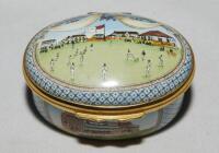 'Bicentenary of the M.C.C.'. Halcyon Days oval enamelled pill box. The lid with a cricket match at Lord's, the hinged lid revealing title 'To commemorate the Bicentenary of the Marylebone Cricket Club 1787-1987' and small vignette of Thomas Lord. The oute