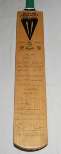 Worcestershire C.C.C. 'Wesso Dolly 93 for 2' 1993. Duncan Fearnley full size bat for the Martin Weston and Damian D'Oliveira benefit of 1993. The bat nicely signed to the face by thirteen members of the England team, and eighteen members of the 1993 Austr