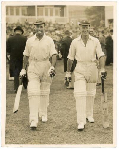 The Ashes. England v Australia 1938. Two original sepia press photographs of action from the first Test at Trent Bridge, 10th- 14th June 1938. One image, from the second day's play, depicts Fingleton and Brown walking out to open Australia's first innings