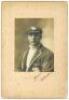 Herbert 'Bert' Strudwick. Surrey &amp; England 1902-1927. Original sepia studio portrait of Strudwick, three quarters length wearing his England cap and blazer. The photograph, laid to photographer's mount, is very nicely signed in black ink to the image 