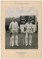 Leonard 'Jock' Livingston. New South Wales &amp; Northamptonshire 1941-1957. Original mono photograph of Livingston and Geoffrey Bispham standing wearing batting attire in front of the scoreboard at Royton Cricket, Bowling and Tennis Club. The scoreboard 
