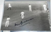 Don Bradman 1938-1948. Black file comprising a selection of thirty three original and restrike press photographs of Bradman, the majority in match action from Ashes Test of the late 1930s and 1948, others at functions, travelling, press portraits etc. Fou