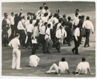Pakistan tour to England 1967. Excellent large original mono press photograph depicting crowds of Pakistan supporters invading the pitch to celebrate Asif Iqbal reaching his century in the third and final Test at The Oval, 24th- 28th August 1967. Asif Iqb