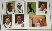 Surrey C.C.C. 1980s-2000s. Two large albums, one comprising a selection of over sixty trade and official player portrait cards, and photographs, mainly candid. The majority signed by the featured player. Signatures include 'Surrey Cricket' cards of Tim Mu