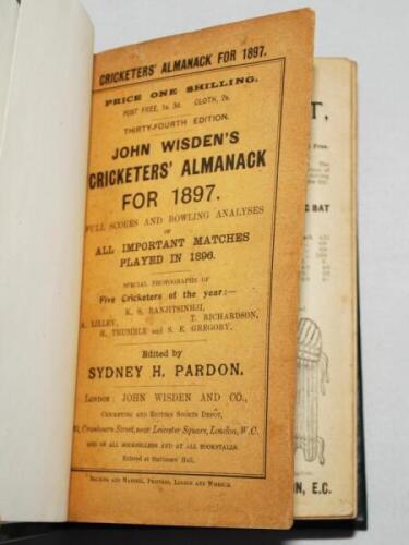 Wisden Cricketers' Almanack 1897 and 1899. 34th &amp; 36th editions. The 1897 edition bound in green boards with original paper wrappers, with gilt titles to spine. Small repair to top edge of front wrapper, small tear to rear wrapper, nick to top edge of