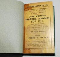 Wisden Cricketers' Almanack 1917. 54th edition. Nicely bound in green boards, with original wrappers bound in, titles in gilt to spine. Some staining to front wrapper, old horizontal tape marks to edges of wrappers and front and rear otherwise in good/ver