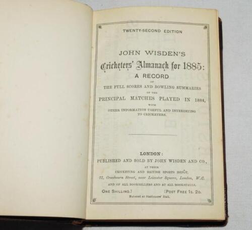 Wisden Cricketers' Almanack 1885. 22nd edition. Bound in maroon half leather boards, lacking original paper wrappers, with titles in gilt to spine, red speckled page edges. Lacking first and rear advertising pages, some wear to boards, minor wear to wrapp