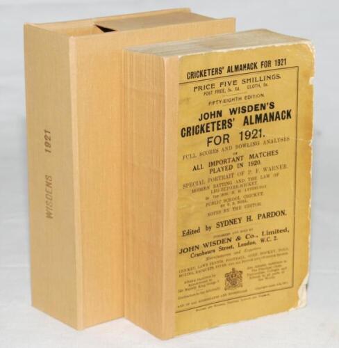 Wisden Cricketers' Almanack 1921. 58th edition. Original paper wrappers. Replacement spine, some wear to wrappers with small loss to edges of both wrappers otherwise in good/very good condition. Stored in light brown slip case - cricket