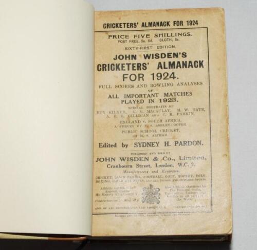 Wisden Cricketers' Almanack 1924. 61st edition. Handsomely bound in brown and cream half leather boards, original paper wrappers, with titles in gilt to spine. Some light fading and discolouration to wrappers otherwise in good condition - cricket