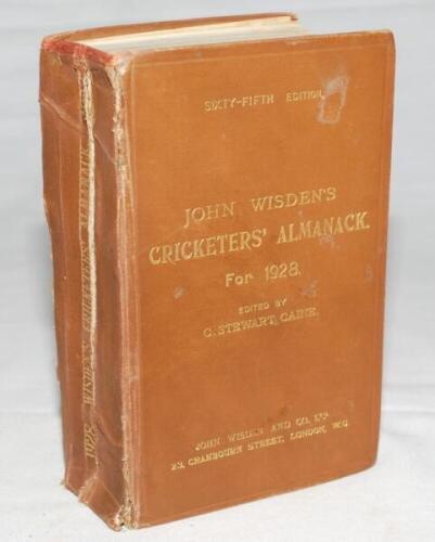 Wisden Cricketers' Almanack 1928. 65th edition. Original hardback. Heavy wear to spine paper, with vertical tears to edges and to centre crease of the spine, restored top edge of spine, the boards with general wear and odd marks, some dulling to gilt titl