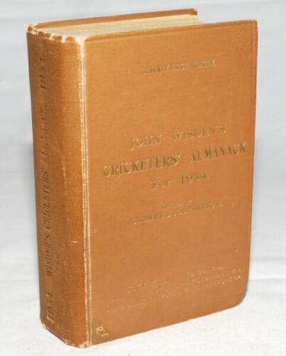 Wisden Cricketers' Almanack 1934. 71st edition. Original hardback. Some wear to boards and spine, some wear to board extremities, some dulling to the gilt titles on the front board, the gilt titles on the spine totally dulled, some bumping to lower corner