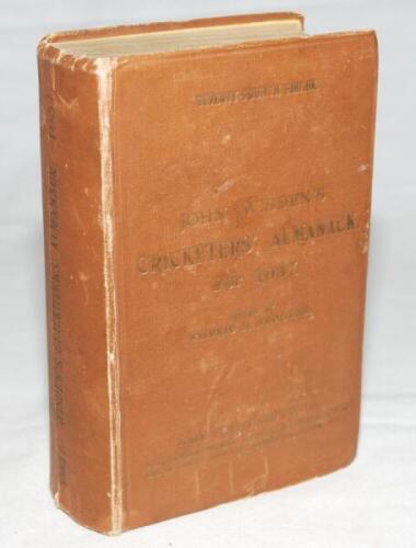 Wisden Cricketers' Almanack 1937. 74th edition. Original hardback. Worn, soiled and stained boards and spine, wear to board edges, dulled gilt titles, bumping to corners, handwritten name and date to inside front and rear board, some drawing to yellow end