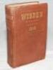 Wisden Cricketers' Almanack 1940. 77th edition. Original hardback. Limited number of copies printed in this war year. Worn and soiled boards, heavy bump to lower left hand corner of front board, wear and bumping to top right hand corner of front board whe