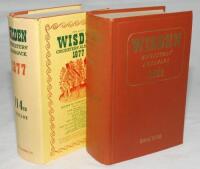 Wisden Cricketers' Almanack 1963 and 1977. Original hardback editions. Very minor wear to the gilt titles on the spine paper otherwise in very good condition. The 1977 edition with dustwrapper, light crease to the spine paper, minor wear to the top edge o
