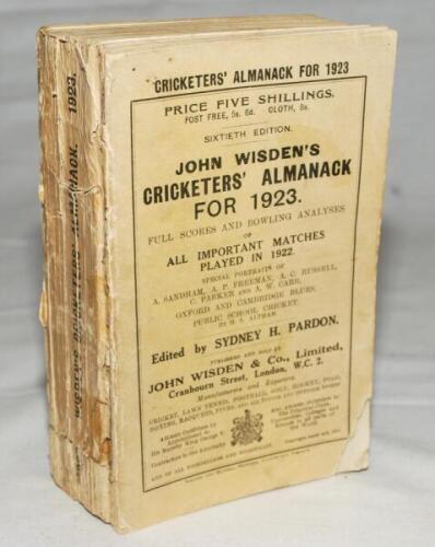 Wisden Cricketers' Almanack 1923. 60th edition. Original paper wrappers. Breaking to spine block, page sections becoming loose, some light fading to wrappers and spine, wear and loss to spine paper, small loss to bottom corner of front wrapper otherwise i