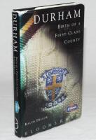 'Durham. Birth of a First-Class County'. Ralph Dellor. London 1992. Hardback with dustwrapper. Approx. sixty signatures to the front and rear endpapers and the odd page including Paul Parker, David Graveney, Wayne Larkins, Graeme Fowler, Phil Bainbridge, 