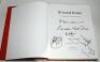 'Ground Rules. A Celebration of Test Cricket'. Edited by Barney Spencer. Dakini Books, London 2003. Bound in full red leather with gilt titles to front cover and spine, large embossed cricket ball emblem to front and white stitching to cover extremities. - 2