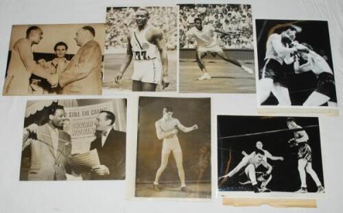 Sporting press photographs 1930s-1990s. A selection of approx. fifty original mono press photographs, with the odd colour photograph covering boxing, tennis, Olympics and snooker. Earlier boxing photographs (some restrikes) include Italian boxer and actor