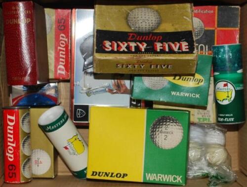 Golf balls. Box comprising a good selection of golf balls, the majority Dunlop in original boxes and tubes, some in original wrapping. Includes 'Seve Icon', Masters 2000, 'Tiger Woods Collectors Series 2000 US Open Champion' in presentation tin, also a bo