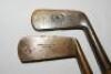 Golf. Two early golf putters. William Tedder brass putter with pain face, stamped to verso 'W. Tedder Bulwell Forest' with flower emblem to centre. Early 1900s. James. B. Halley &amp; Co. brass putter with grooved face and stamped to verso, 'Jas. B. Halle - 2