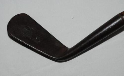 Hand forged Lofting Cleek c.1885. Faint mark for 'A.&amp;N.C.S.L. [Army and Navy Cooperative Stores Ltd?]' to rear of club head. Hickory shaft with suede leather grip. Good original condition - golf