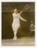 Tennis photographs 1920s. Two original mono press photographs, one of American tennis player, Molla Mallory in action in the Ladies semi-final of the 1926 Wimbledon Championships. According to the press label to verso the match was attended by King Alphon - 3