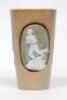 Rugby Union. Doulton Lambeth stoneware beaker with overall impressed floral motif decoration, moulded in relief with three figures in roundels of William Webb Ellis, first kicking the ball, then picking up and running with the ball and being involved in a