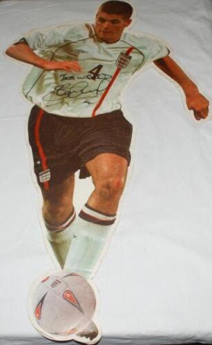 England footballers c.2000. Six large double-sided colour cut-out figures of England footballers early 2000s, each signed to one side by the featured player. Signatures are David Seaman, Rio Ferdinand, Sol Campbell, Paul Scholes, Steven Gerrard, and Micha