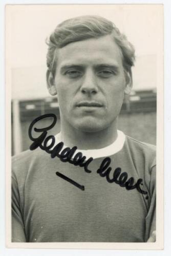 Gordon West. Blackpool, Everton, Tranmere Rovers &amp; England 1960-1979. Mono real photograph plain back postcard of West, head and shoulders, wearing football attire. Signed in thick black ink to the photograph by West. Photographer unknown. VG - footba