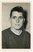 Alan Hodgkinson. Sheffield United &amp; England 1954-1971. Mono post card size real photograph of Hodgkinson, head and shoulders, wearing football attire. Signed in blue ink to the photograph by Hodgkinson. Stamp for A. Wilkes &amp; Son, West Bromwich to 