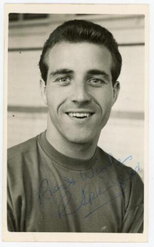 Ron Springett. Sheffield Wednesday, Queen's Park Rangers &amp; England 1953-1969. Mono post card size real photograph of Springett, head and shoulders, wearing football attire. Signed in blue ink to the photograph by Springett. Stamp for A. Wilkes &amp; S