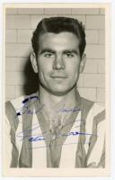 Peter Swan. Sheffield Wednesday &amp; England 1953-1969. Mono post card size real photograph of Swan, head and shoulders, wearing Sheffield Wednesday shirt. Signed in blue ink to the photograph by Swan. Stamp for A. Wilkes &amp; Son, West Bromwich to vers