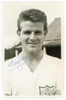 Stanley 'Stan' Brown. Fulham &amp; Colchester United 1959-1973. Mono Fulham F.C. Supporters Club post card size real photograph of Brown, head and shoulders, wearing football attire. Signed in blue ink to the photograph by Brown. Stamp for Fulham F.C. Sup