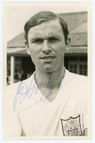 John Dempsey. Fulham, Chelsea etc. 1964-1984. Mono Fulham F.C. Supporters Club post card size real photograph of Dempsey, head and shoulders, wearing Fulham shirt. Signed in blue ink to the photograph by Dempsey. Stamp for Fulham F.C. Supporters Club to v