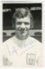 Wilf Tranter. Manchester United, Brighton &amp; Hove Albion, Fulham etc. 1962-1972. Mono Fulham F.C. Supporters Club post card size real photograph of Tranter, head and shoulders, wearing Fulham shirt. Signed in blue ink to the photograph by Tranter. VG -