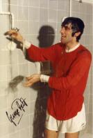 George Best. Manchester United. Colour copy photograph of Best, dressed in full United kit in the shower, signed to the image by Best. 8&quot;x12&quot;. VG - football