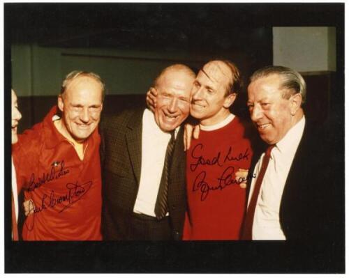 Bobby Charlton and Jack Crompton. Manchester United. Colour copy photograph of Charlton, dressed in full United kit, embracing Matt Busby, with Jack Crompton and one other standing either side. The photograph nicely signed in black ink by Charlton and Cro
