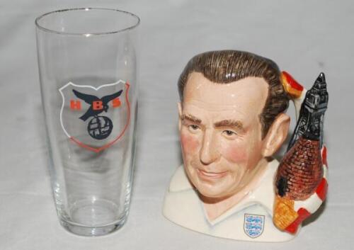 Stanley Matthews. Stoke City, Blackpool &amp; England. Royal Doulton ceramic caricature toby jug of Matthews in England shirt. Limited edition 199/5000, 5" tall. Sold with a drinking glass with emblem of HBS Craeyenhout F.C. of the Hague, Holland to 