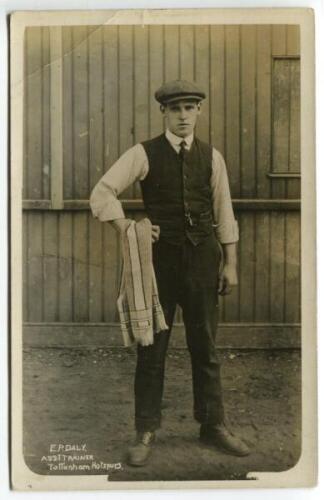 E.P. Daly. Tottenham Hotspur, assistant trainer circa 1900. Sepia real photograph postcard of Daly, full length, wearing flat cap with a towel over his arm. The postcard by Jones Brothers of Tottenham. Crease to top left hand corner otherwise in good cond