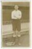 Solomon Upton. Tottenham Hotspur 1912. Sepia real photograph postcard of Upton, full length in Spurs attire in front of the main stand. Jones Bros of Tottenham. The printed title with handwritten change with 'Tottenham Hotspur' crossed out and 'Portsmouth