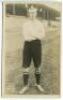 R. Watt. Tottenham Hotspur 1908. Sepia real photograph postcard of Watt, full length in Spurs attire, in front of the main stand. Jones Bros of Tottenham. Good condition - football