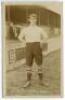 J.W. Wilkinson. Tottenham Hotspur 1906-1907. Sepia real photograph postcard of Wilkinson, full length in Spurs attire, in front of the main stand. Jones Bros of Tottenham. Good condition - footballWilkinson played twice for Spurs in the 1906-1907 season