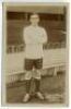 William Findlay Weir. Tottenham Hotspur 1912-1915. Sepia real photograph postcard of Weir, full length in Spurs attire, in front of the main stand. The title reads 'Finlay Weir. Tottenham Hotspur'. Jones Bros of Tottenham. Very good condition - footballFi