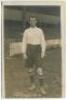 Tom H. Morris. Tottenham Hotspur 1899-1913. Early mono real photograph postcard of Morris, full length, in Spurs attire. Title to lower border 'T. Morris. Tottenham Hotspur 1909-10'. F.W. Jones, Tottenham. The postcard appears to have been trimmed to lowe