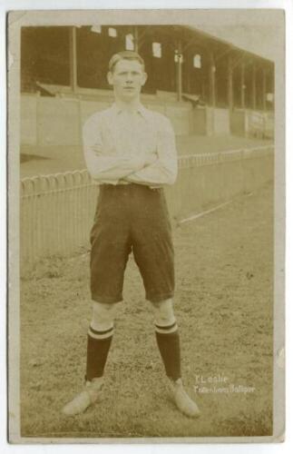 Thomas Scott Leslie. Tottenham Hotspur 1908-1911. Early sepia real photograph postcard of Leslie, full length, in Spurs attire. Jones Bros of Tottenham. Minor light fading otherwise in good condition. Postally unused - footballTommy Leslie made fourteen a